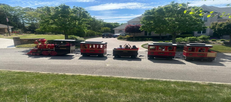 https://ajassets.nyc3.cdn.digitaloceanspaces.com/AJ-COM/products/thumbs/tiny_800_356_DC__train_in_neighborhood_330.jpg