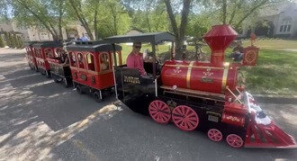 https://ajassets.nyc3.cdn.digitaloceanspaces.com/AJ-COM/products/thumbs/tiny_800_356_DC_train_with_conductor_330.jpg